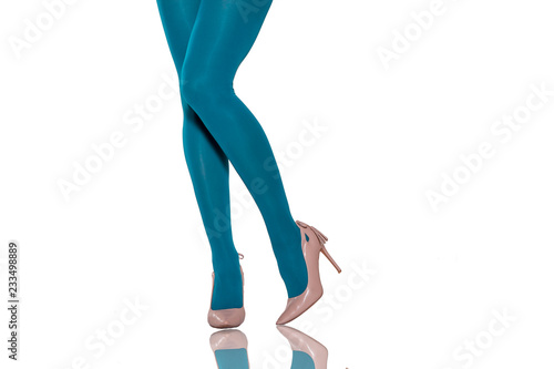 female legs in bright blue tights