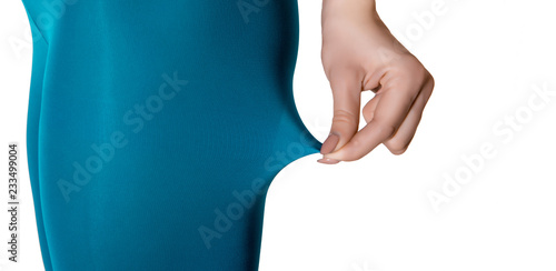 female legs in bright blue tights photo