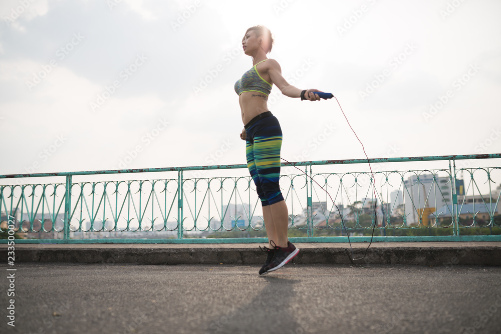 Skipping young woman