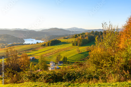 Fototapeta Naklejka Na Ścianę i Meble -  Polanczyk, Bieszczady mountains, Poland - views during sunrise on Solina Lake from hill near Polanczyk town (south-east region in Poland)