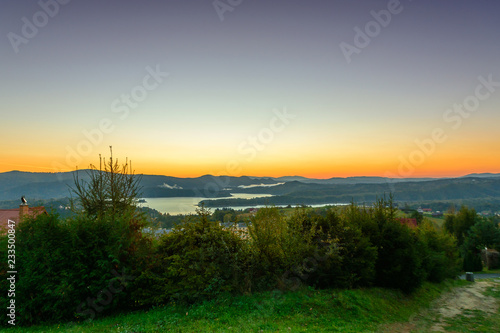 Polanczyk, Bieszczady mountains, Poland - views during sunrise on Solina Lake from hill near Polanczyk town (south-east region in Poland)