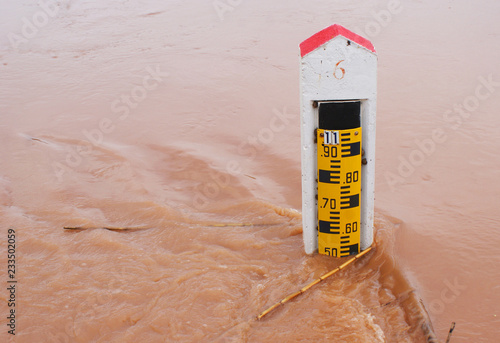 er on river - Water level gauges tool for level measurement flood in rainy season warning - measure ruler photo