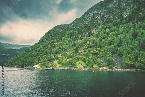 Mountain landscape with cloudy sky. Majestic Geiranger fjord. Beautiful nature of Norway © vvvita