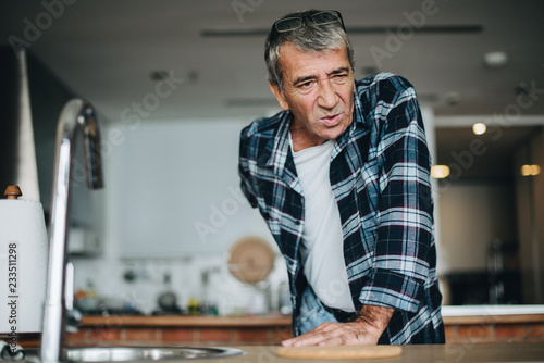 Quadro su tela Senior man having back pain