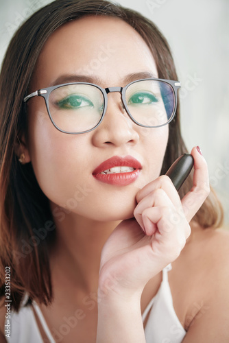 Asian woman in glasses