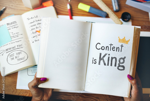 Content is king written on a book photo