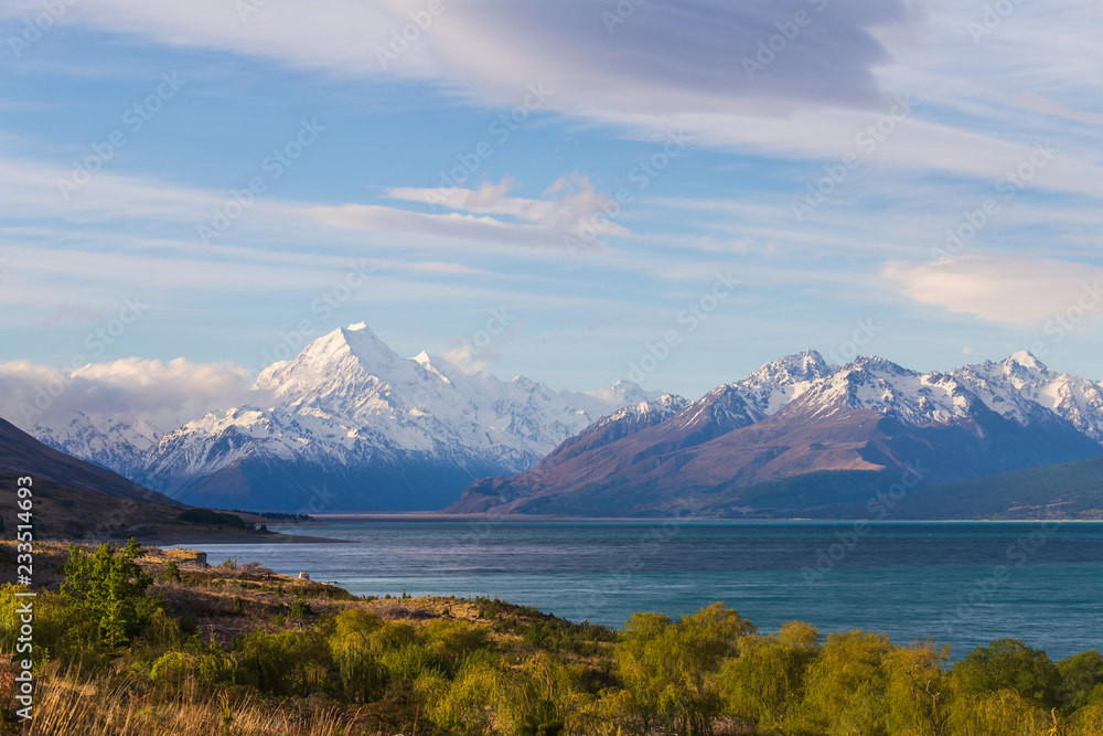 New Zealand Aoraki Mount Cook with snow capped and lake Pukaki under the sky cloud like a painting New Zealand Aoraki Mount Cook with snow capped and lake Pukaki under the sky cloud like a painting