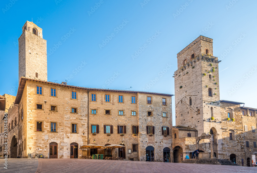 View at the Cisterna place with Tower of Devil (Torre del Diavolo) in San Gimignano - Italy