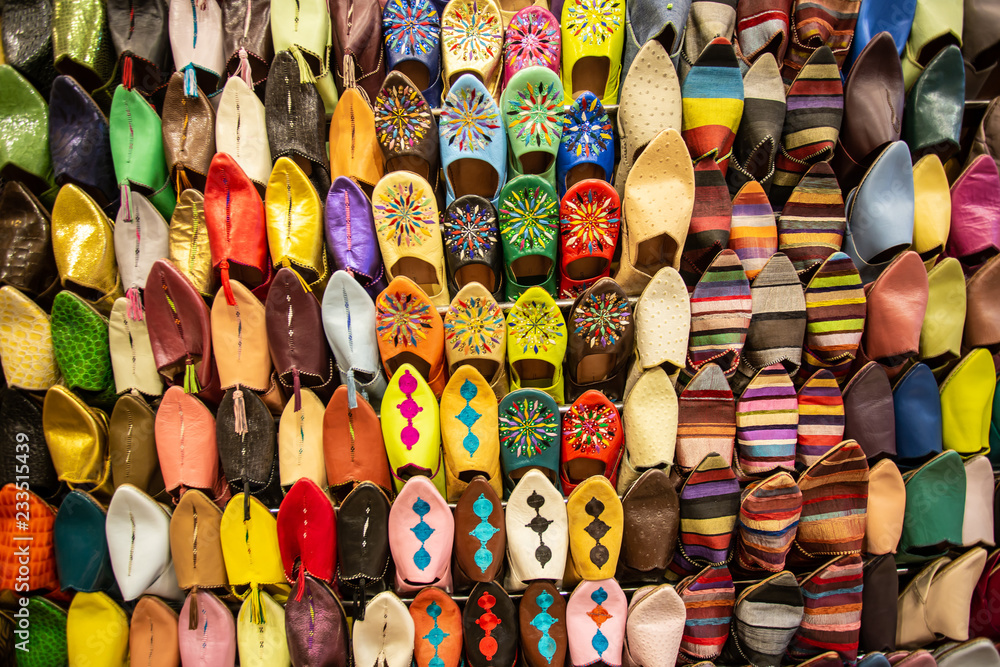 Colorful handmade leather slippers (babouches) on a market in Marrakech, Morocco