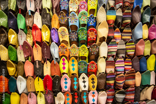 Colorful handmade leather slippers (babouches) on a market in Marrakech, Morocco