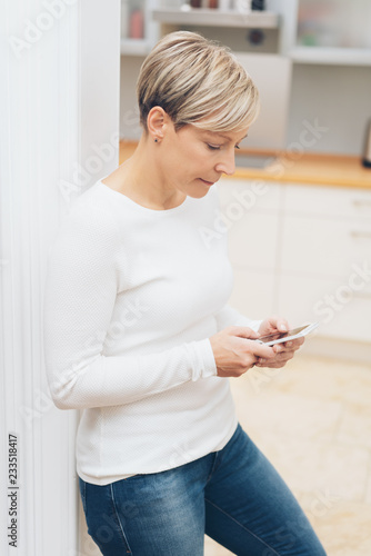 Attractive athletic woman in blue jeans