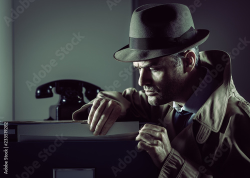 Undercover spy stealing files