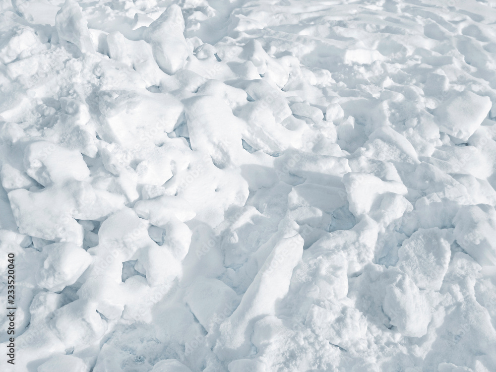 Snow chunks of ice. Full frame. Natural winter background.