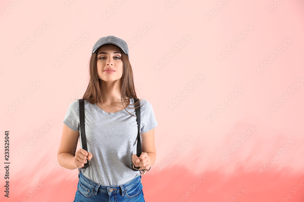 Young woman in stylish t-shirt on color background Young woman in stylish t-shirt on color background