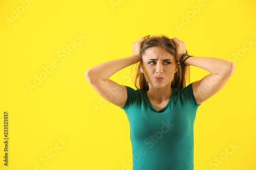 Emotional young woman after...