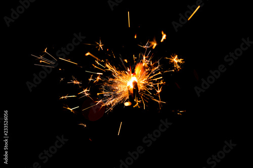 Wallpaper Mural Festive Christmas sparklers on dark background Torontodigital.ca