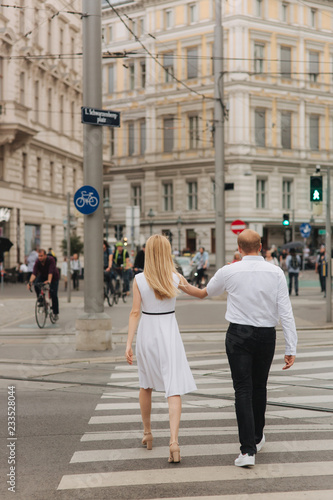 Lovely couple walking around the city. During the summer