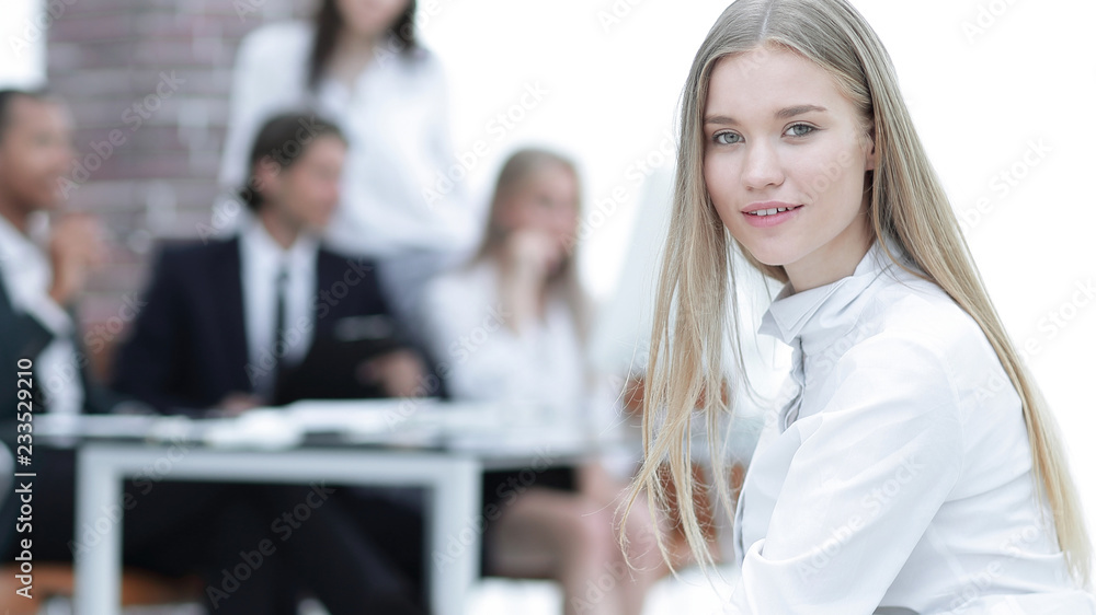 young business woman on the background of the office young business woman on the background of the office