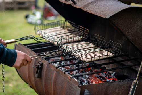 closeup of sausages on the barbecue in outdoor