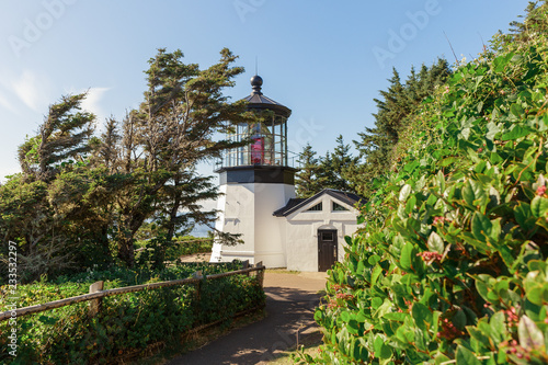 Cape Meares Lighthouse over the Pacific Ocean photo