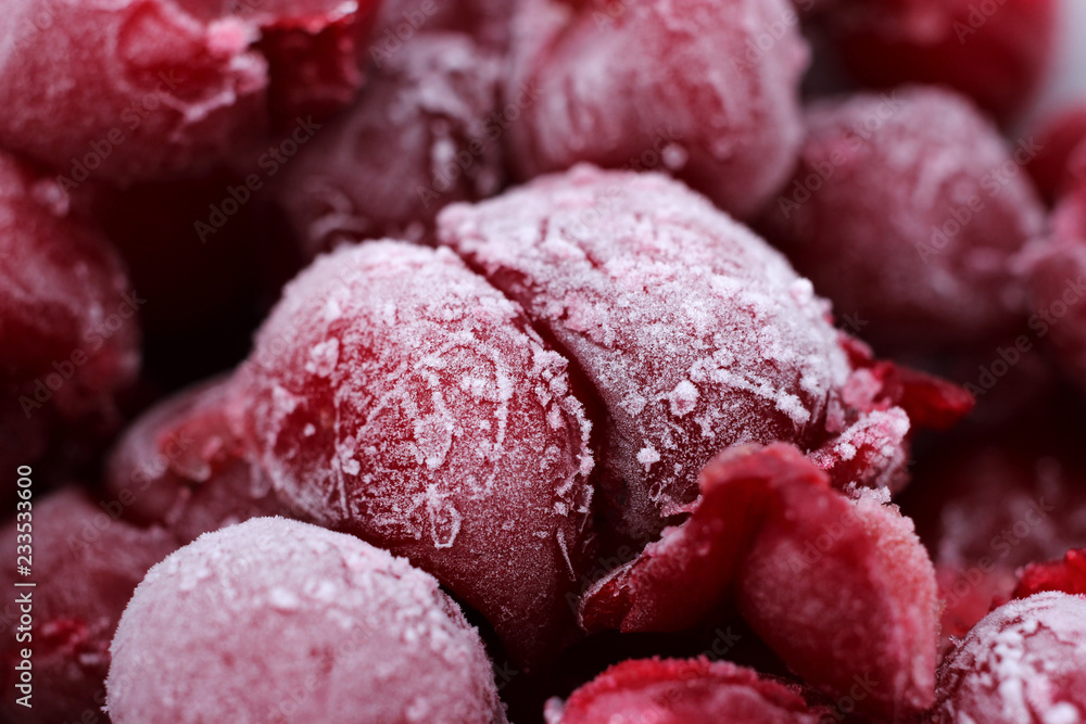 Fresh frozen cherries are covered with frost. Fresh frozen cherries are covered with frost.