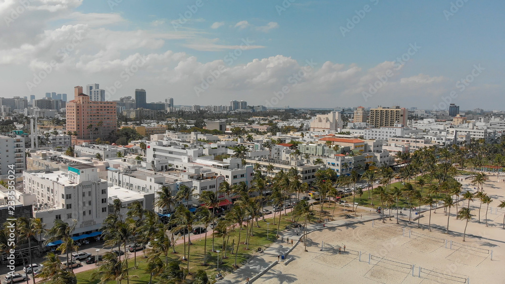 Aerial view of Miami Beach skyline and coastline on a sunny day, Florida Aerial view of Miami Beach skyline and coastline on a sunny day, Florida