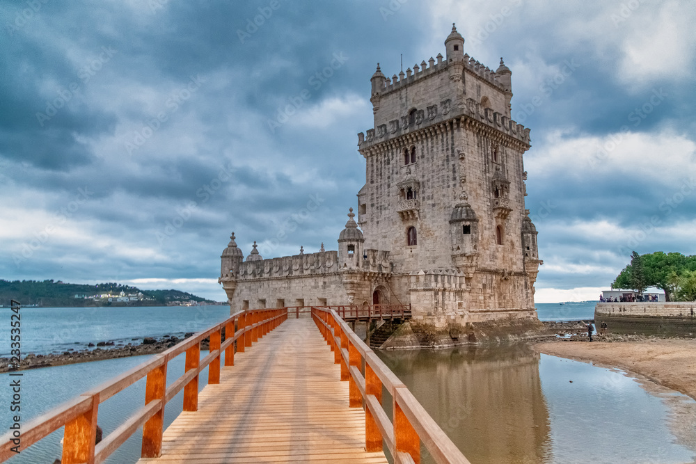 Belem Tower at sunset with clouds in the sky, Lisbon