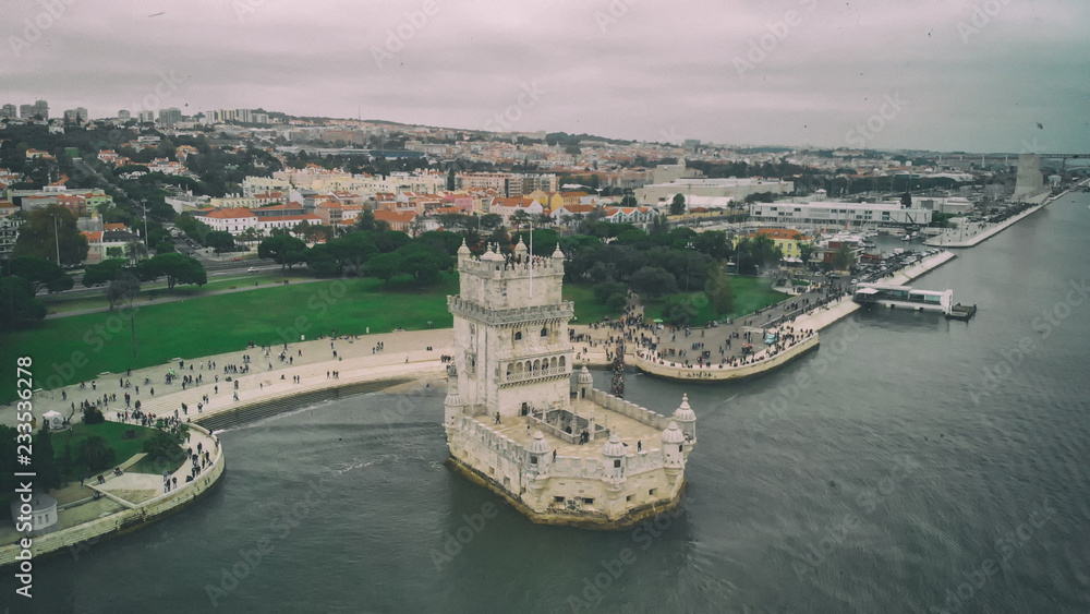 Fototapeta premium Belem Tower aerial view on cloudy day, Lisbon - Portugal