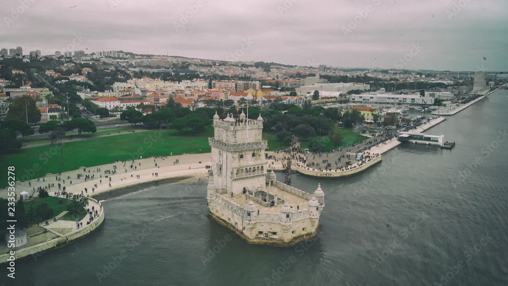 Belem Tower aerial view on cloudy day, Lisbon - Portugal