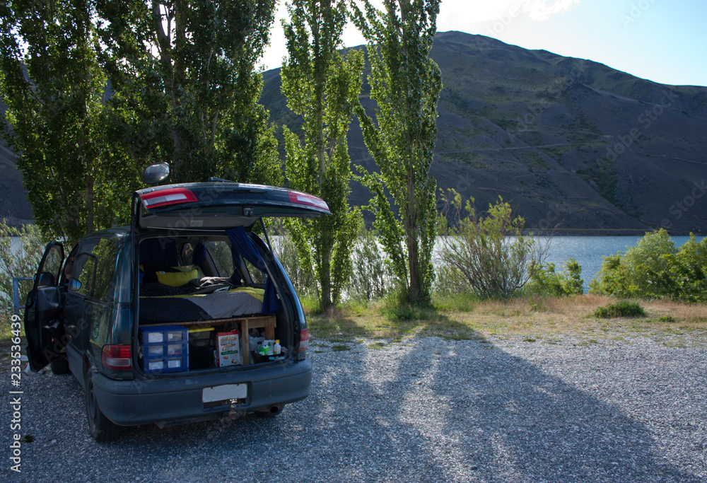 Free camping with a camper van by the dam between Alexandra and Clyde in New Zealand