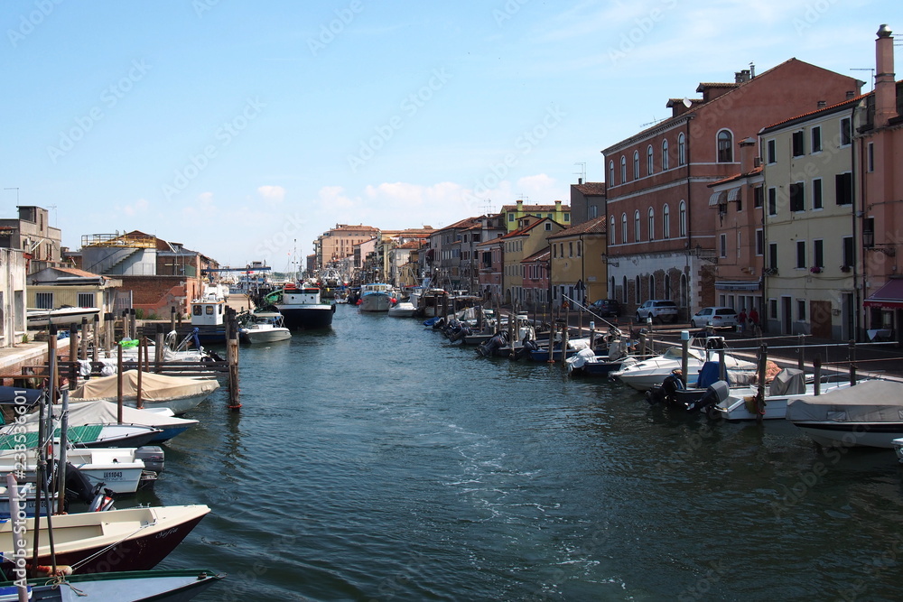 Romantic town of small Venice with water channel and boats
