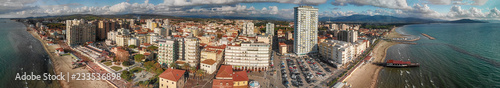 Panoramic aerial view of Follonica, Italy. Coastline of Tuscany with town and ocean