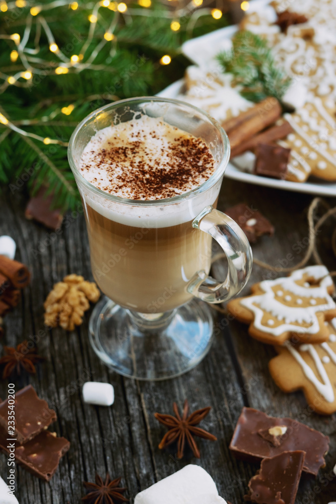 Cappuccino -coffee in transparent cup with christmas cookies Cappuccino -coffee in transparent cup with christmas cookies