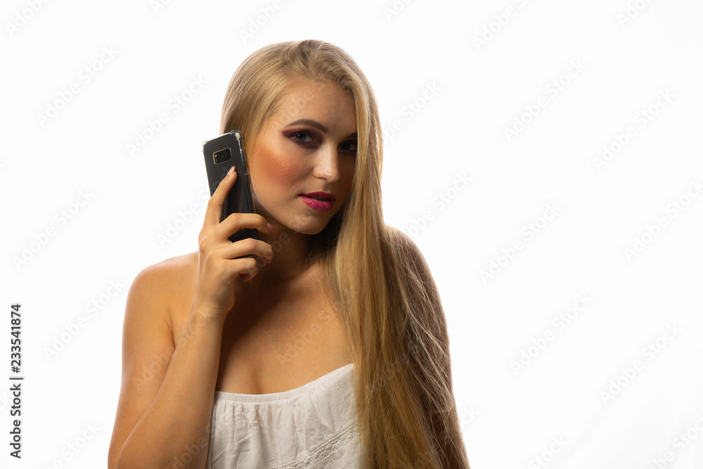 Young girl talking on the phone Young girl talking on the phone