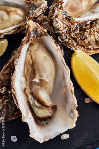 Fine de claire oysters with lemon slices