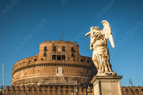 11/09/2018 - Rome, Italy: Sunset view of Castel Sant'angelo from the park with tourists walking