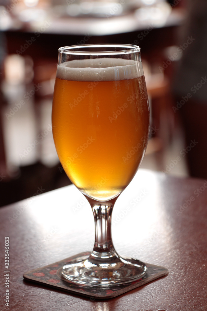 glass of beer on table