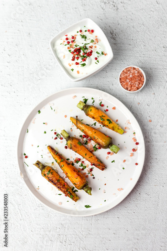 Healthy roasted carrots On white background