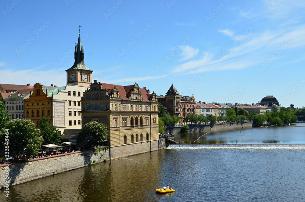 View from Charles Bridge to the capital city of Prague Kampa