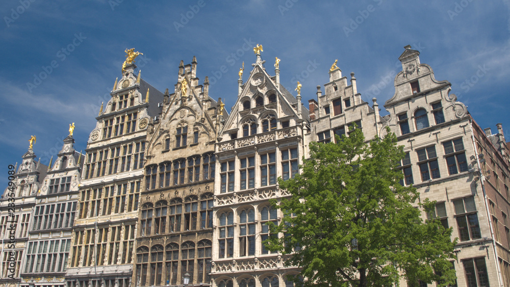 CLOSE UP: Rich golden ornamentation on monumental buildings at Grote markt