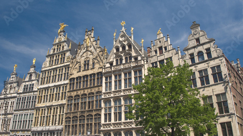 CLOSE UP: Rich golden ornamentation on monumental buildings at Grote markt © helivideo