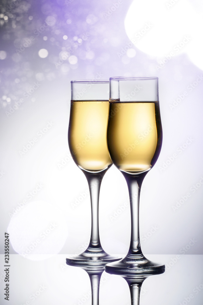 Two elegant glasses with sparkling champagne Two elegant glasses with sparkling champagne