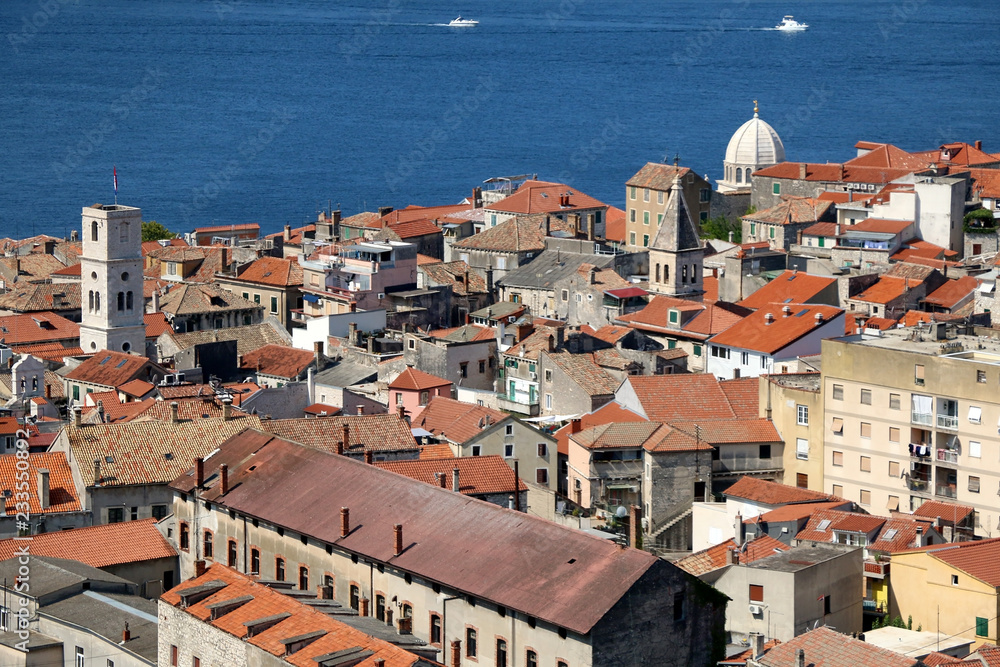 Historic city centre of Sibenik, Croatia with the dome of the Cathedral of St. James, famous UNESCO World Heritage Site. Adriatic Sea in the background. View from the Barone Fortress.