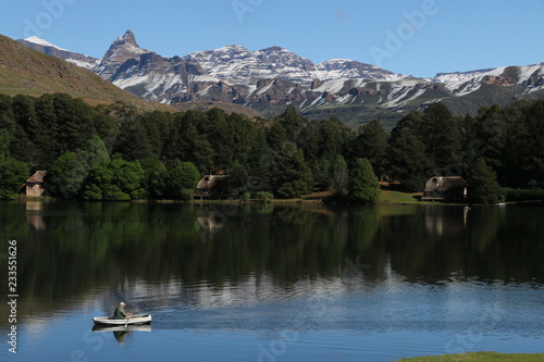 The snow-capped Drakensberg (Dragon's Mountains) tower over Lake Navarone