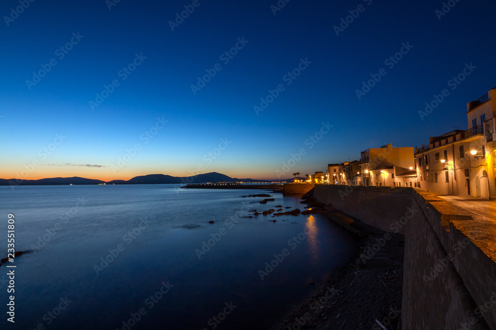 Obraz premium Alghero harbor at night. Italy