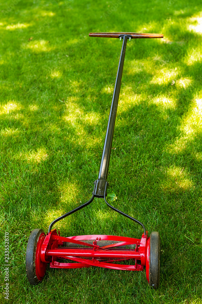 full view of a reel lawnmower after the restoration process was