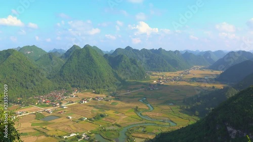 Time lapse of amazing rice fields in valley with karst mountains and limestone peaks in Bac Son, Vietnam.