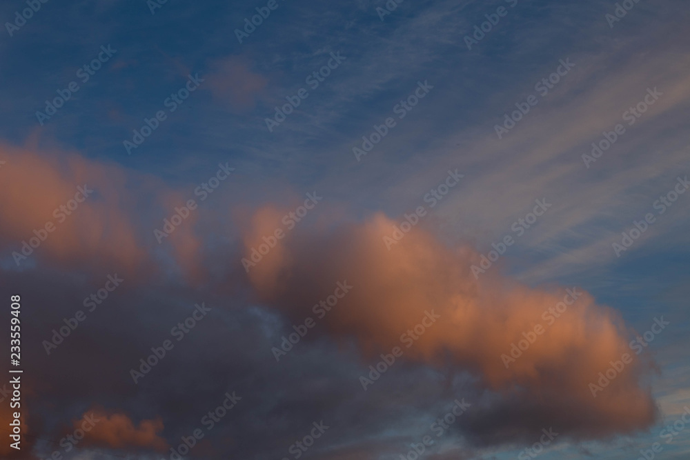 clouds illuminated by the setting sun, shot in late autumn