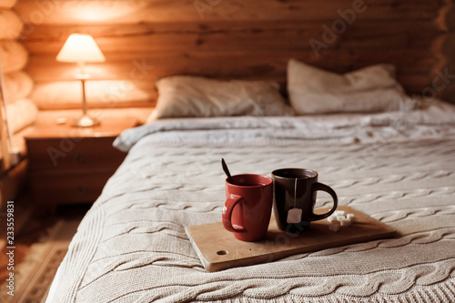 Cozy winter weekend in log cabin photo