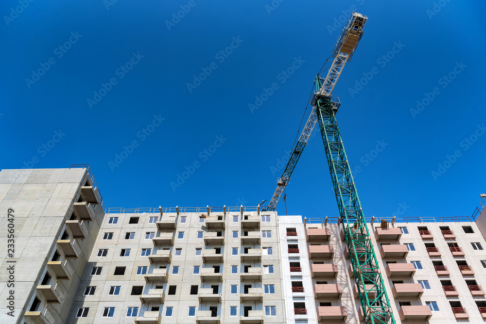 Modern construction site of building with crane